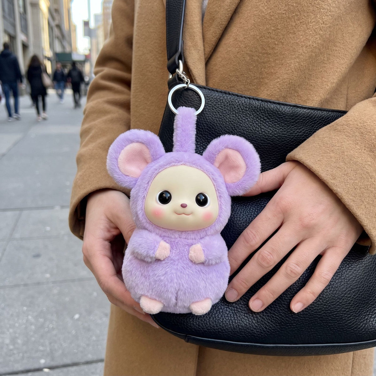 Mochi Mouse Bag Charm on a shoulder bag
